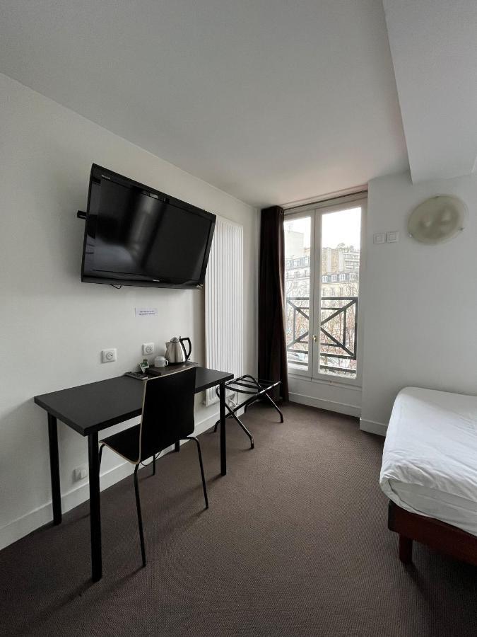 Hotel De La Tour Париж Экстерьер фото